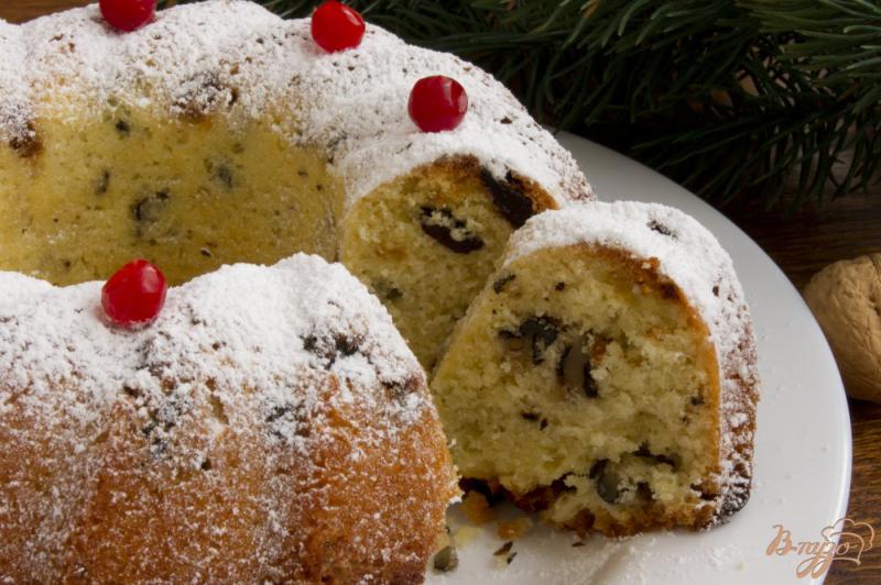 Фото приготовление рецепта: Рождественский кекс с орехами и сухофруктами шаг №7