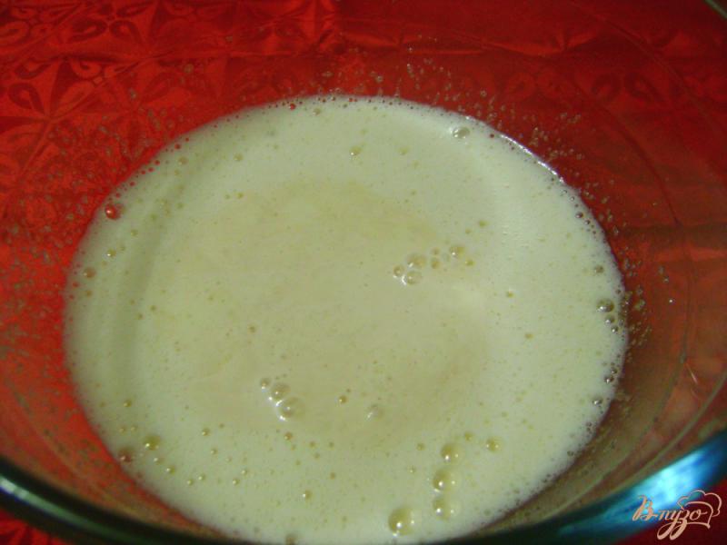 Фото приготовление рецепта: Апельсиновый кекс на ряженке шаг №2