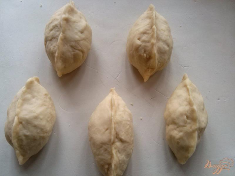 Фото приготовление рецепта: Пирожки на кефире с арахисовой пастой шаг №3