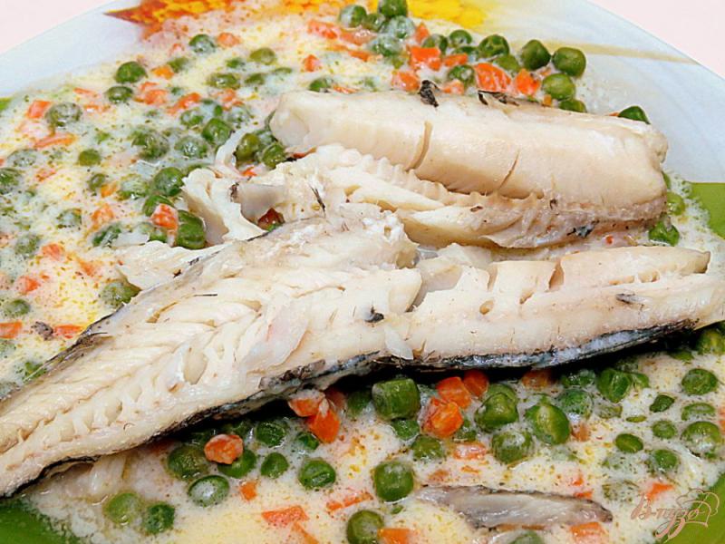 Фото приготовление рецепта: Рыба под овощным соусом шаг №12