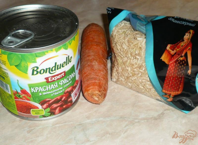 Фото приготовление рецепта: Рисовый томатный суп с фасолью шаг №2