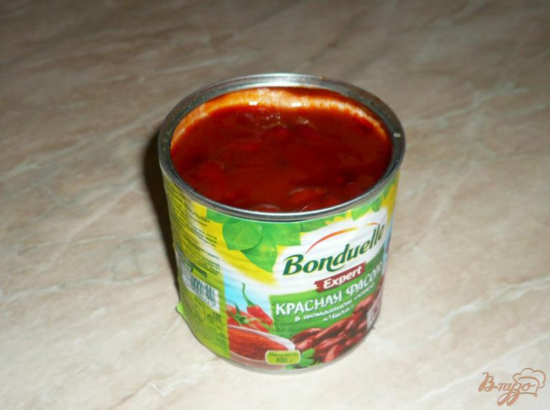 Фото приготовление рецепта: Рисовый томатный суп с фасолью шаг №5