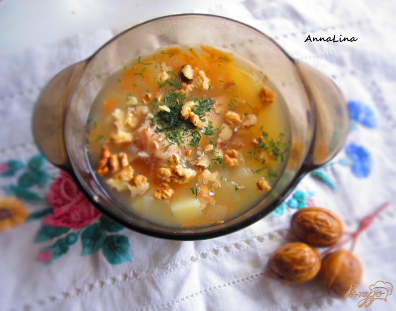 Фото приготовление рецепта: Суп с кроликом, яблоком и грецкими орехами шаг №7