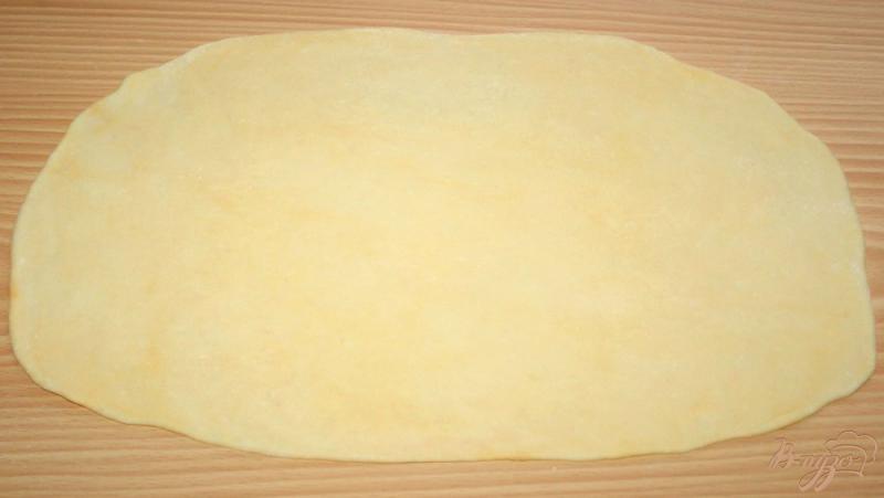Фото приготовление рецепта: Домашняя паста с нутом и маслинами шаг №7