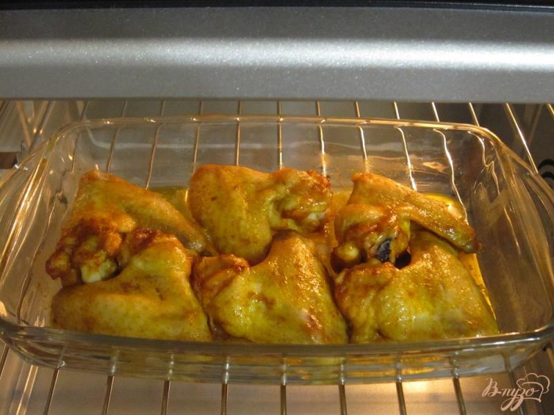 Фото приготовление рецепта: Запеченные куриные крылья шаг №6