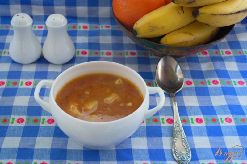 Фото приготовление рецепта: Томатный суп с мясом и макаронами шаг №7