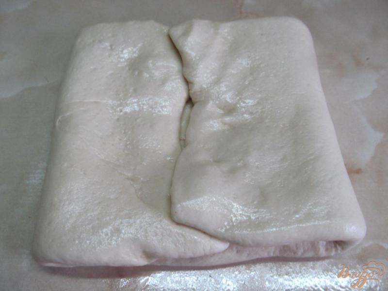 Фото приготовление рецепта: Хлеб-улитка с паприкой и кориандром шаг №12