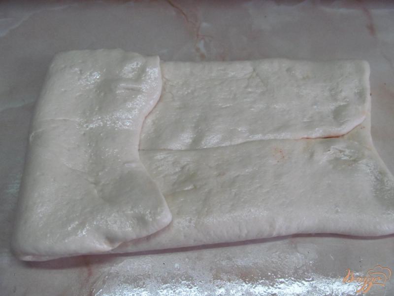 Фото приготовление рецепта: Хлеб-улитка с паприкой и кориандром шаг №11