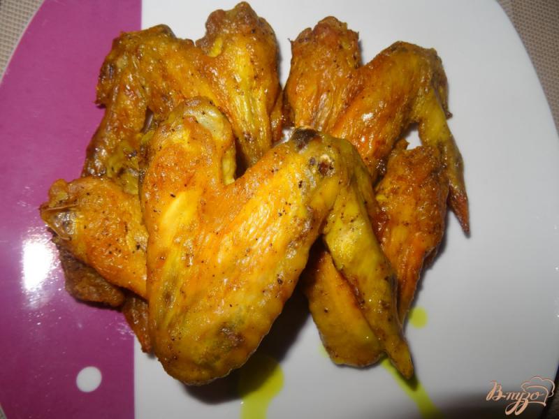 Фото приготовление рецепта: Куриные крылышки маринованные в майонезе шаг №6