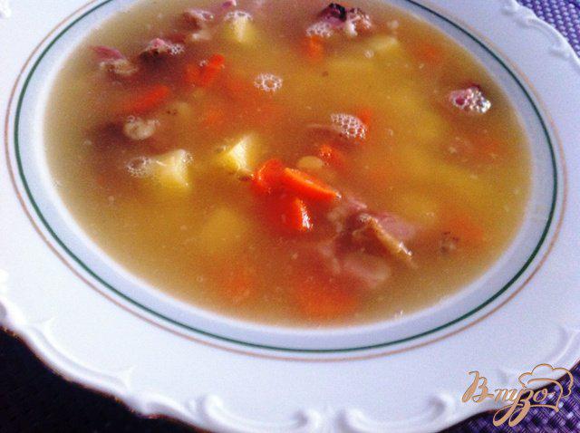 Фото приготовление рецепта: Гороховый суп с копчеными ребрышками шаг №7