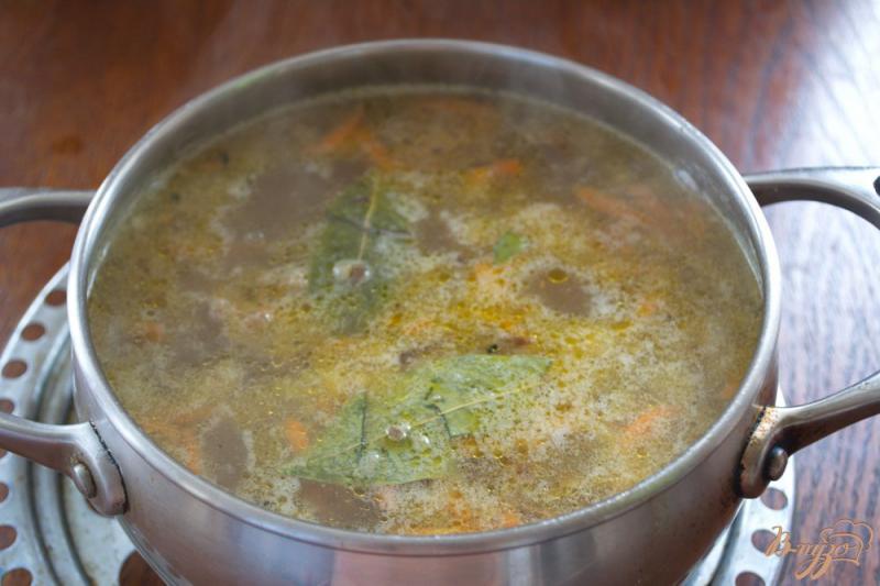 Фото приготовление рецепта: Рисовый суп с фаршем шаг №6