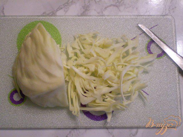 Фото приготовление рецепта: Суп капустный с пшеном и яйцами шаг №2