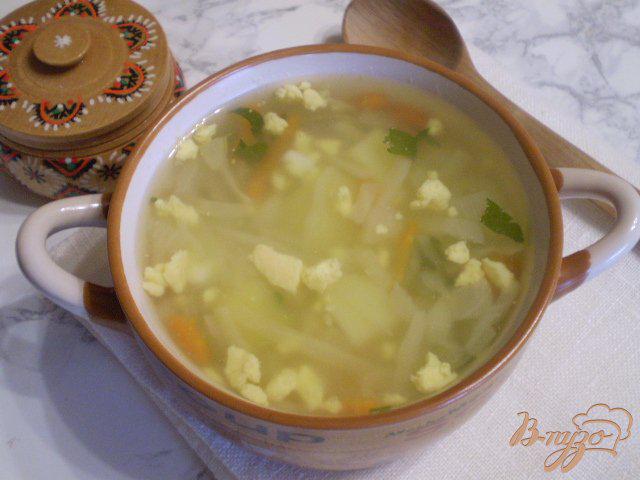 Фото приготовление рецепта: Суп капустный с пшеном и яйцами шаг №10