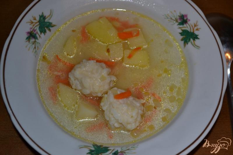 Фото приготовление рецепта: Суп с фрикаделями из риса и курицы шаг №12