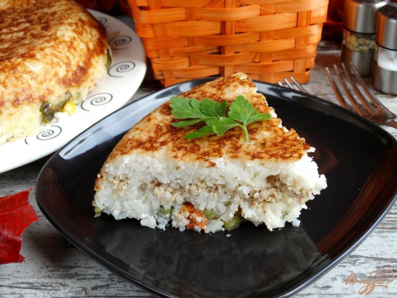 Фото приготовление рецепта: Сытная рисовая запеканка со свининой и овощами шаг №10