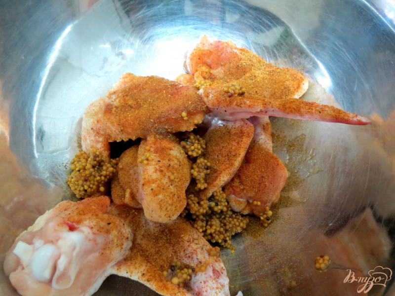 Фото приготовление рецепта: Куриные крылышки в маринаде шаг №3