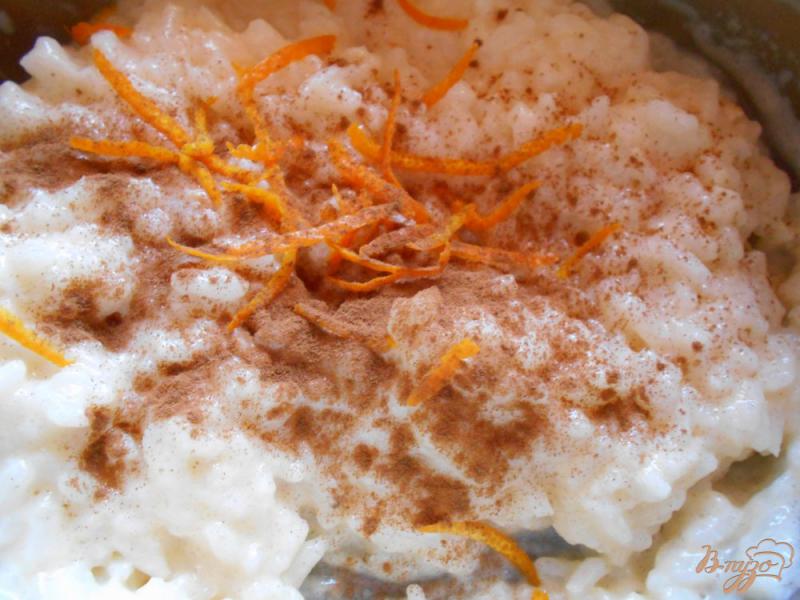 Фото приготовление рецепта: Рисовый пудинг с корицей и апельсином шаг №6