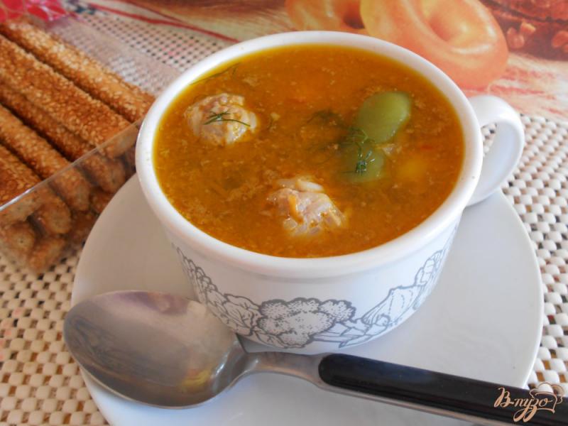 Фото приготовление рецепта: Суп со стручковой фасолью и мясными шариками шаг №7