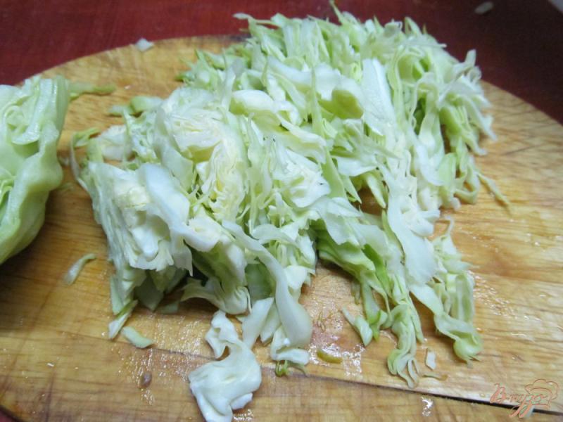 Фото приготовление рецепта: Салат из свиного языка и капусты шаг №4