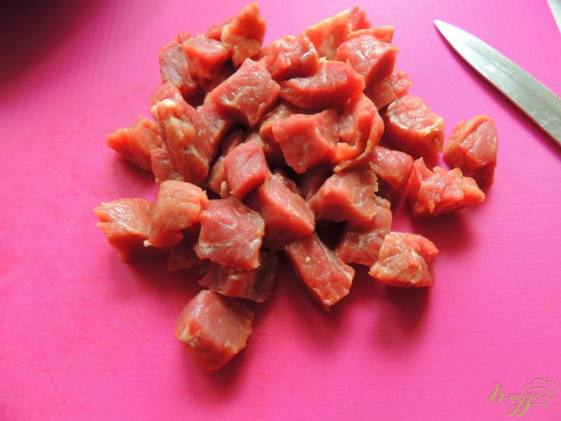 Фото приготовление рецепта: Мясо с овощами в картофельных блинах шаг №1