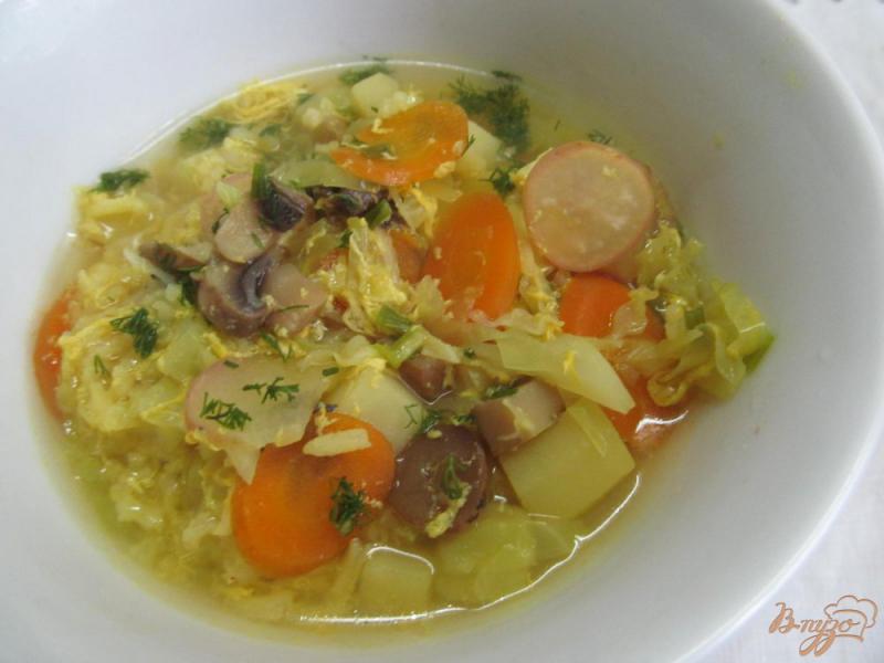 Фото приготовление рецепта: Рисовый суп с овощами шаг №10