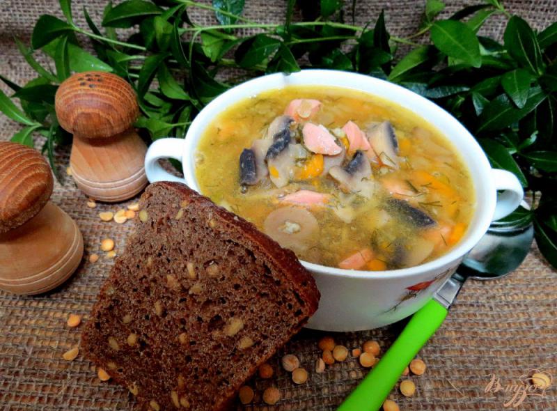Фото приготовление рецепта: Гороховый суп с сосисками и шампиньонами шаг №11