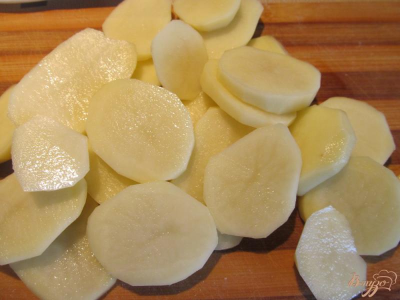 Фото приготовление рецепта: Слоеное овощное рагу из картофеля и кабачков шаг №4