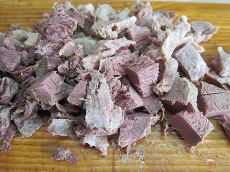 Фото приготовление рецепта: Перец фаршированный отварной свининой шаг №4