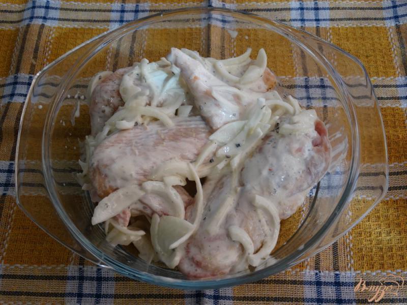 Фото приготовление рецепта: Крылья индейки запеченные в сметанном соусе шаг №6