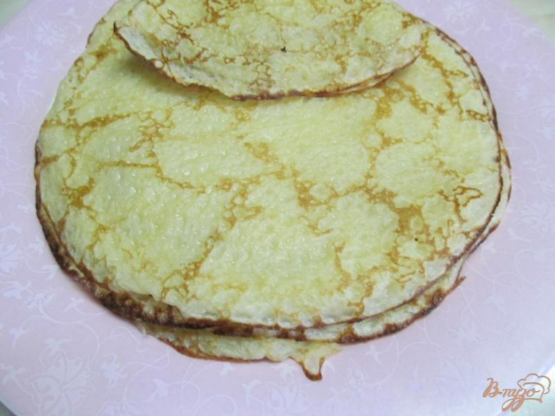 Фото приготовление рецепта: Заварные блинчики на кефире с апельсиновой начинкой шаг №4