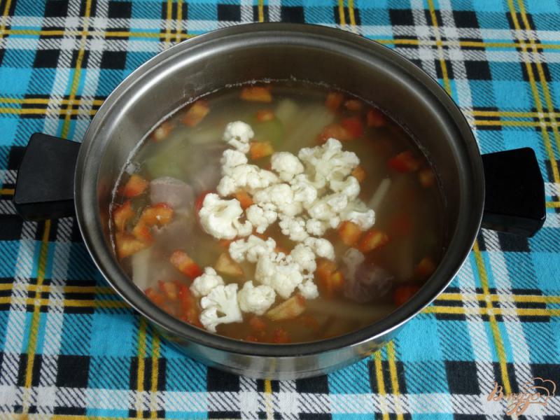 Фото приготовление рецепта: Суп с куриными желудочками и орзо шаг №8