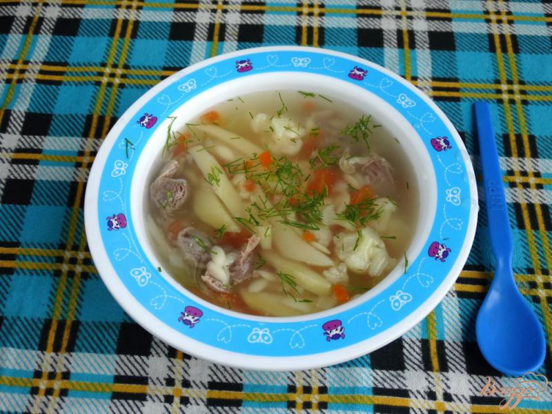 Фото приготовление рецепта: Суп с куриными желудочками и орзо шаг №9