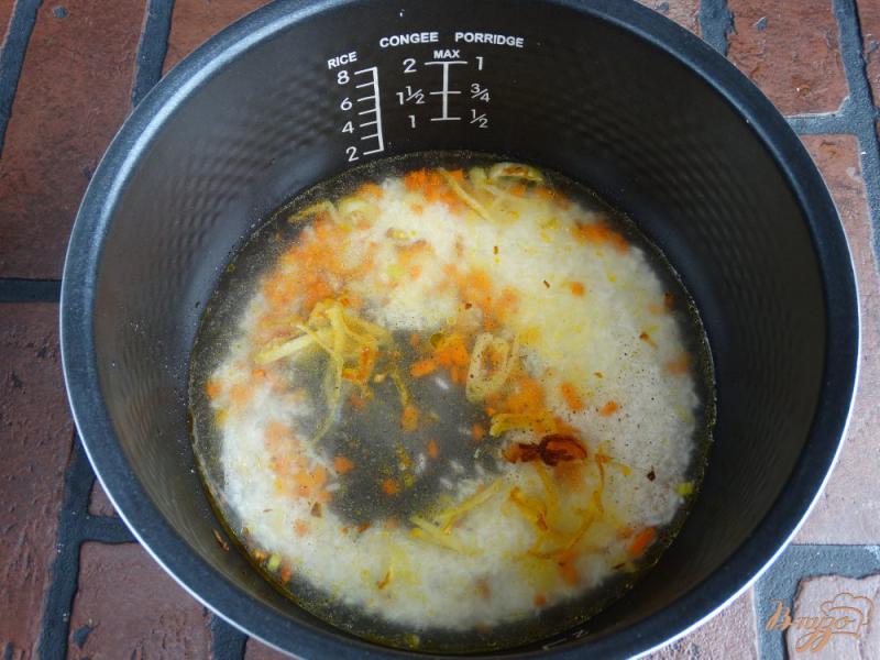 Фото приготовление рецепта: Рисовая каша с черной фасолью шаг №3