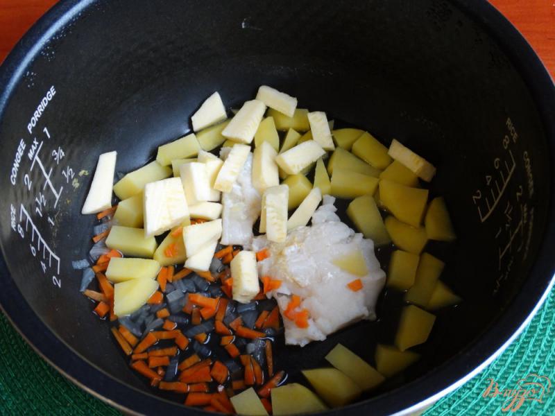 Фото приготовление рецепта: Треска тушенная с овощами в мультиварке шаг №8