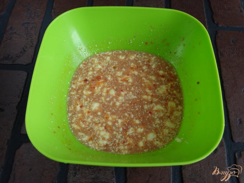 Фото приготовление рецепта: Фаршированные перцы с мясом и перепелиными яйцами шаг №11