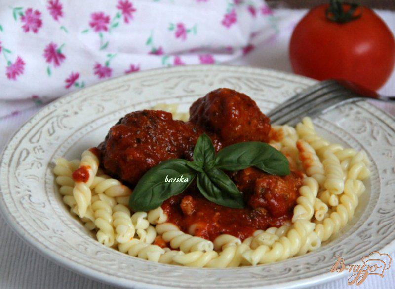 Фото приготовление рецепта: Тефтельки в томатном соусе по-итальянски шаг №9