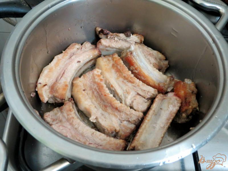Фото приготовление рецепта: Жаркое из свиных рёбрышек шаг №4