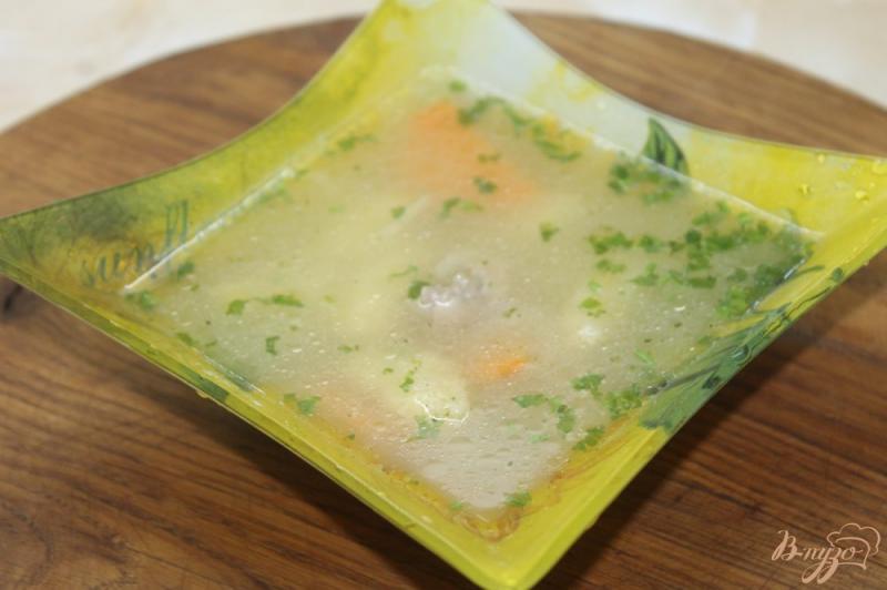 Фото приготовление рецепта: Куриный суп с галушками шаг №7
