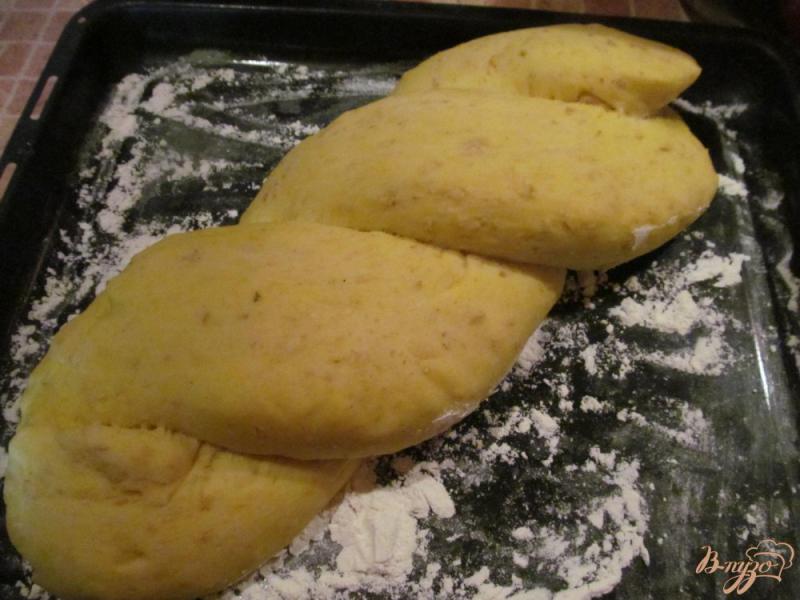 Фото приготовление рецепта: Хлеб на молоке с куркумой и овсяными хлопьями шаг №8