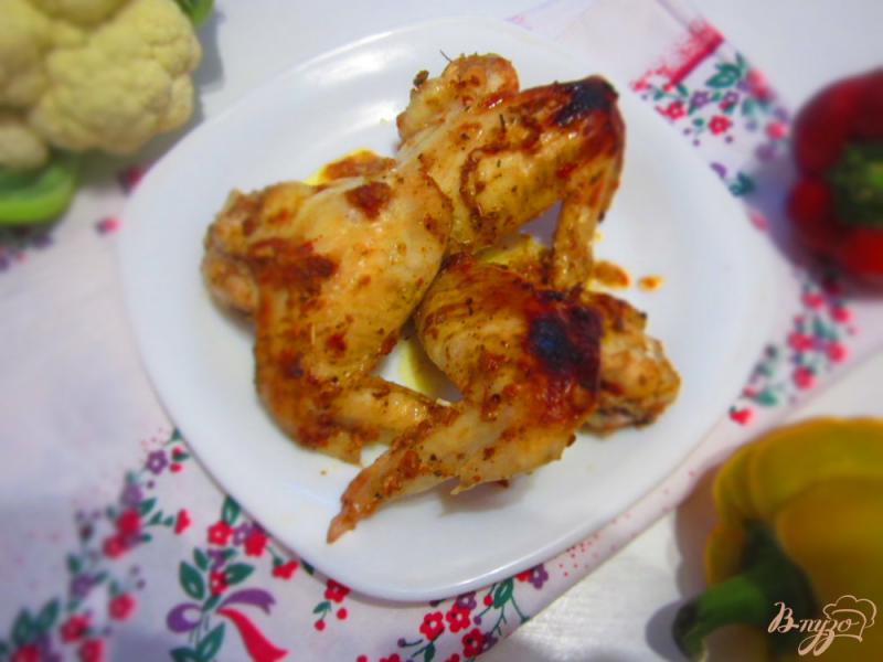 Фото приготовление рецепта: Куриные крылья маринованные в аджике шаг №4