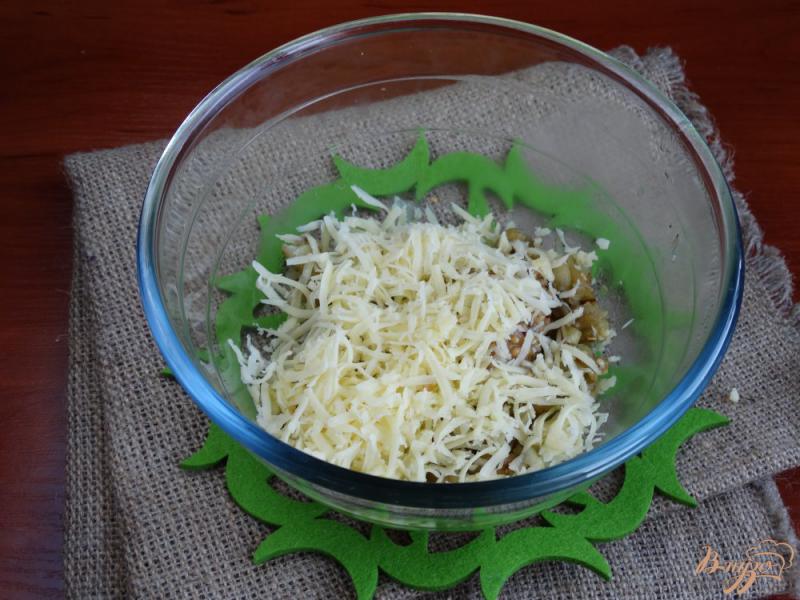 Фото приготовление рецепта: Баклажаны запеченные с сыром и орехами шаг №7