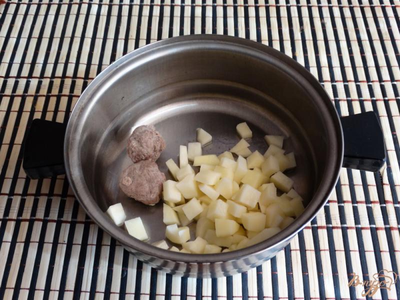 Фото приготовление рецепта: Гречневый суп с молодой капустой шаг №4
