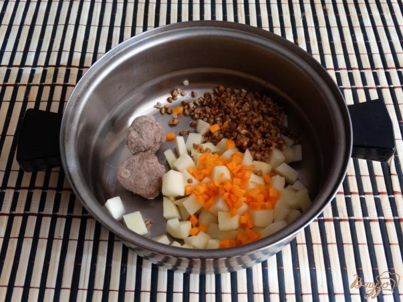 Фото приготовление рецепта: Гречневый суп с молодой капустой шаг №6