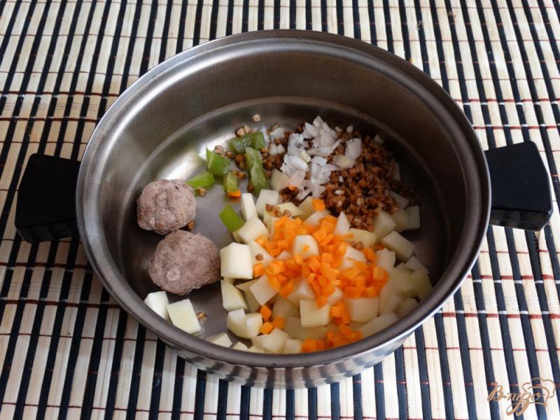 Фото приготовление рецепта: Гречневый суп с молодой капустой шаг №7
