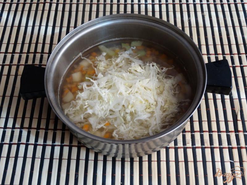 Фото приготовление рецепта: Гречневый суп с молодой капустой шаг №9