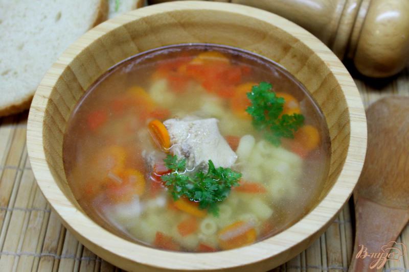 Фото приготовление рецепта: Суп с мясом кролика и вермишелью шаг №5