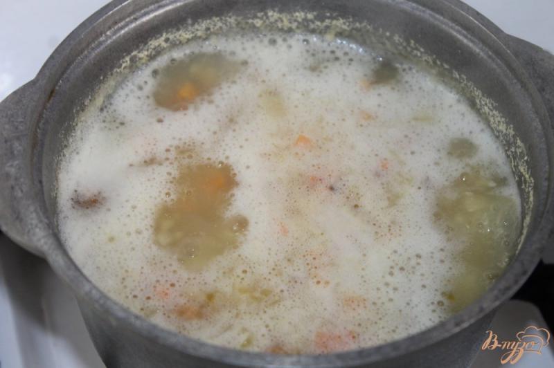 Фото приготовление рецепта: Гороховый суп с копченым куриным филе шаг №7