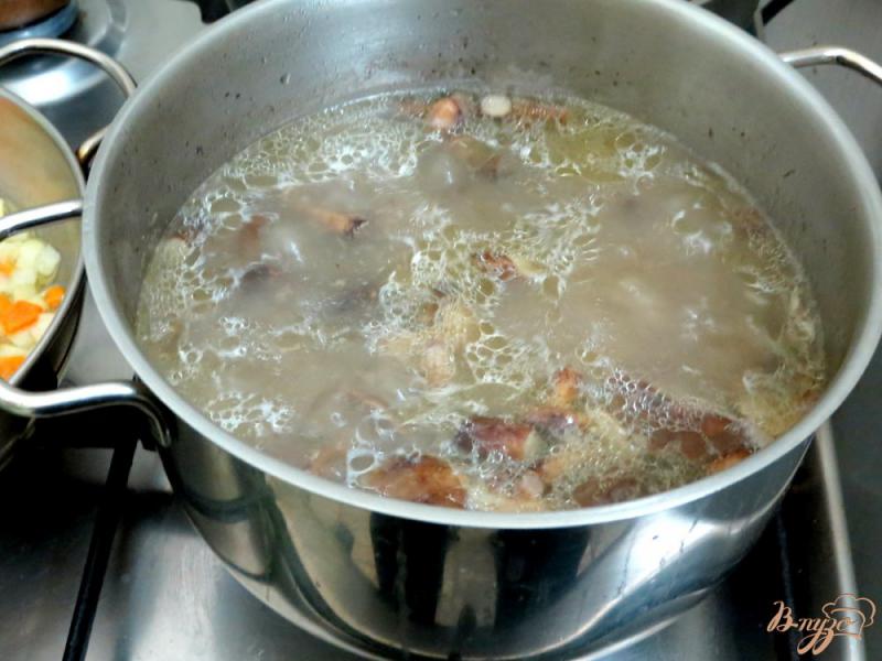 Фото приготовление рецепта: Грибной суп с рисом шаг №3