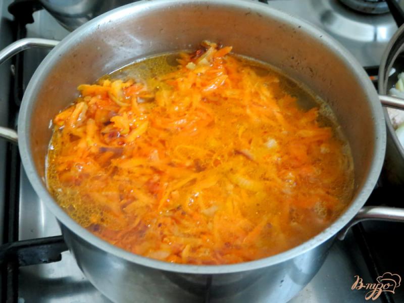 Фото приготовление рецепта: Куриные желудочки в морковном соусе шаг №6