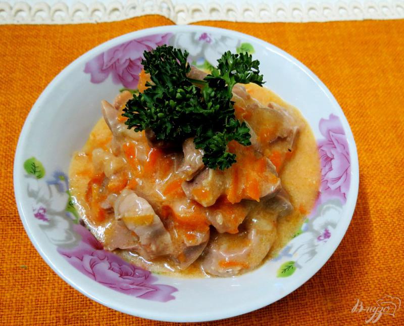 Фото приготовление рецепта: Куриные желудочки в морковном соусе шаг №9